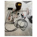 Horseshoe stakes, bushel baskets, extension cord,