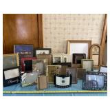 All picture frames on table.