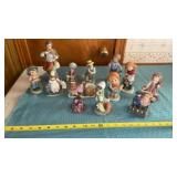 Porcelain figurines, mostly girls boys