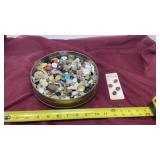 Container of old buttons