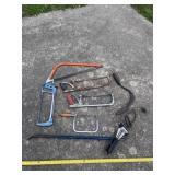 Pry bar, weed thrasher,  hand saws and tank