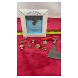 Mostly religious items, lapel, pens, keychain