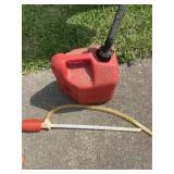 2 gallon empty gas jug and syphon pump.