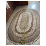 64 x 96 brown oval area rug.