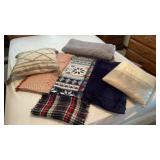 Pillows throws in a gray throw