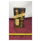 Sealed Canadian club whiskey with two glasses