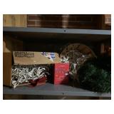 Christmas lights and greenery with lights.