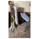 Hammock, metal ironing board, and barber