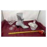Gray shoe planter, wine, glasses, and a lid candy