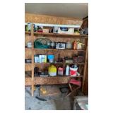 Contents on shelf includes charger, army box with