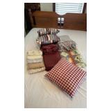 pillows, blankets, dresser, scarves
