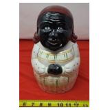 Black Americana Cookie Jar With Crack Down the