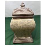 Decorative Canister with a Lid. Features a