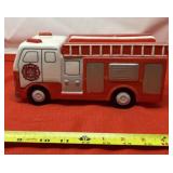 Fire Truck-Shaped Collectible. Likely a ceramic