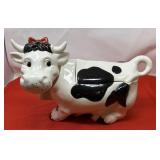 Vintage Ceramic Holstein Cow Cookie Jar. Often