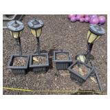 Four Plastic Planters with Solar Lights