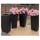 Four Plastic Wicker Vases. Each are 40" Tall