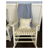 White Rocking Chair With Blanket And Pillow