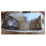 Large Plastic Tote and 2 Bags Of Mulch
