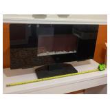 Electric Fireplace Heater. Measures 35" Wide