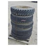 Five truck tires on rims 20"
