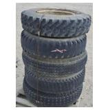 Five Truck Tires on 20" Rims