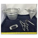 Aluminum Kitchen Utensils Including A Potato
