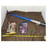 Star Wars Figurine and Light Saber