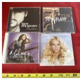 Tim McGraw, Jessica Simpson and Miley Cyrus CDï¿½s