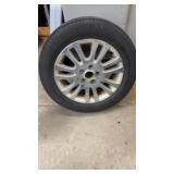 Michelin  P225/60R17 Tire with Wheel off a Nissan