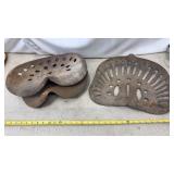 Antique cast iron tractor seats