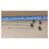 Dragonfly necklaces feature silver-toned metal