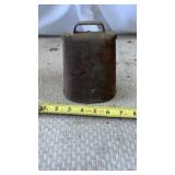Rustic vintage metal cow bell featuring a