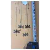 4-dragonfly necklace features a silver-toned