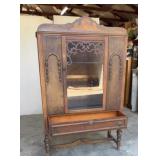 Jacobean style China cabinet with a glass display