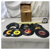 45-RPM records stored in a tan "Platter-pak"