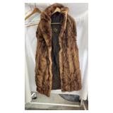 Western Furs brown fur coat featuring a satin