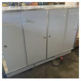 Glass Showcase with Four Glass Shelves. It has a