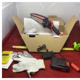 New in Box Cordless Chain Saw with Battery and