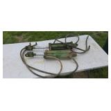 Two John Deere Cylinders One has a Cracked