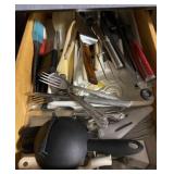 Contents of Drawer Full of Utensils