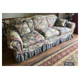 Floral Sofa with Some Tearing and Sagging