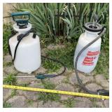 Two Hand Sprayers. One is Full of Weed Killer