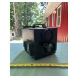 Vintage Black Projector, likely an 8mm Home Movie
