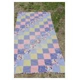 Handmade Patchwork Quilt Features a
