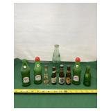 Coca-Cola, Vess, Pabst and Falstaff bottles empty