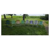 Seven Folding Lawn Chairs and a Bag Chair