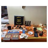 Flashlights, Rulers, Ashtrays with All on Table.