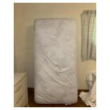Twin Mattress with Cover on Top