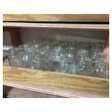 2 Shelves of Canning Jars Different Sizes of Open
